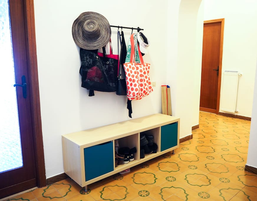 Entryway with storage for your shoes, bags, hats and more..