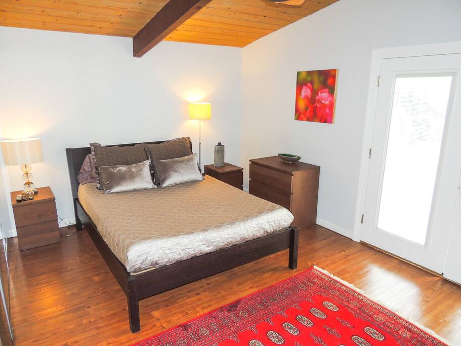 New queen bed with high quality bedding.