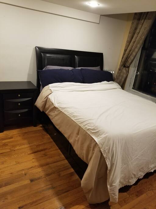 full size bed with memory foam mattress very cozy with night stand