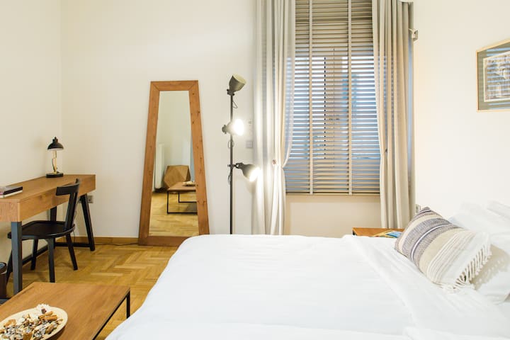 Powder-pink City Vistas from the Balcony at a Minimal Haven gallery image 4