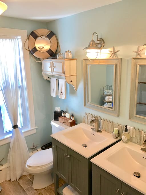 2nd floor remodeled full bathroom with selections of shampoo, conditioner, body wash, and new toothbrushes if needed.