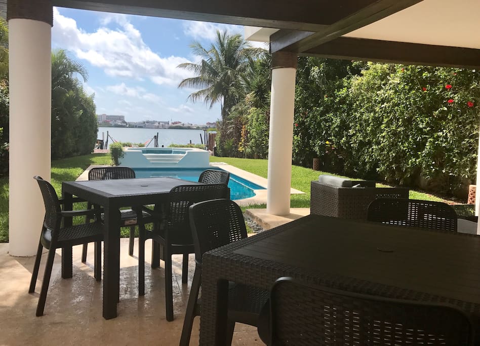 Dining on the terrace with view of the pool and Lagoon