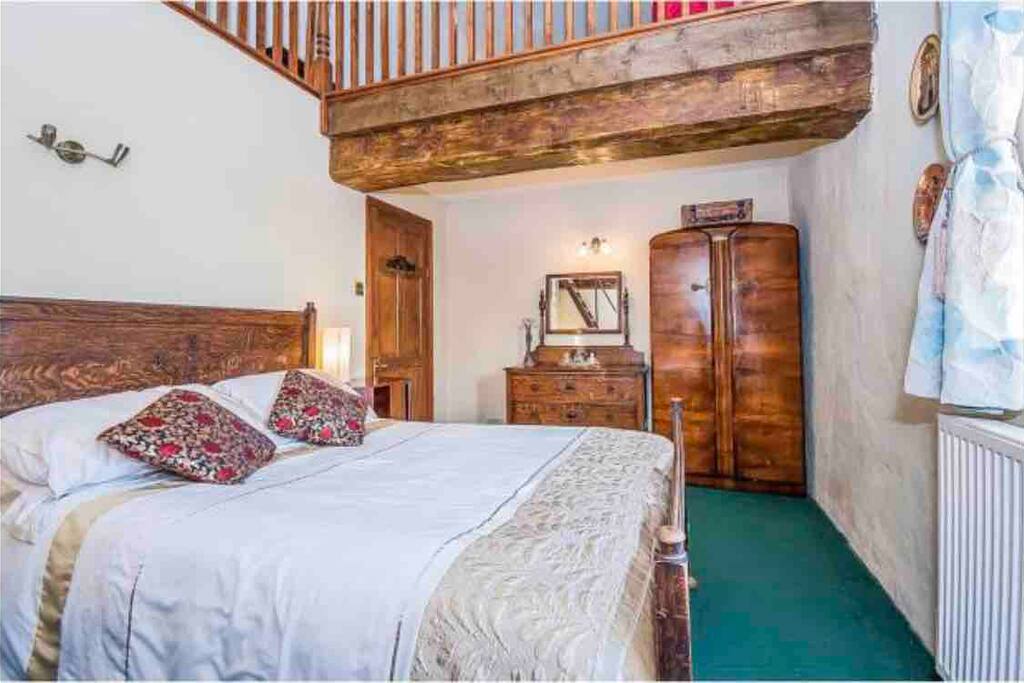 Private room with balcony lounge, full of character and views of the garden