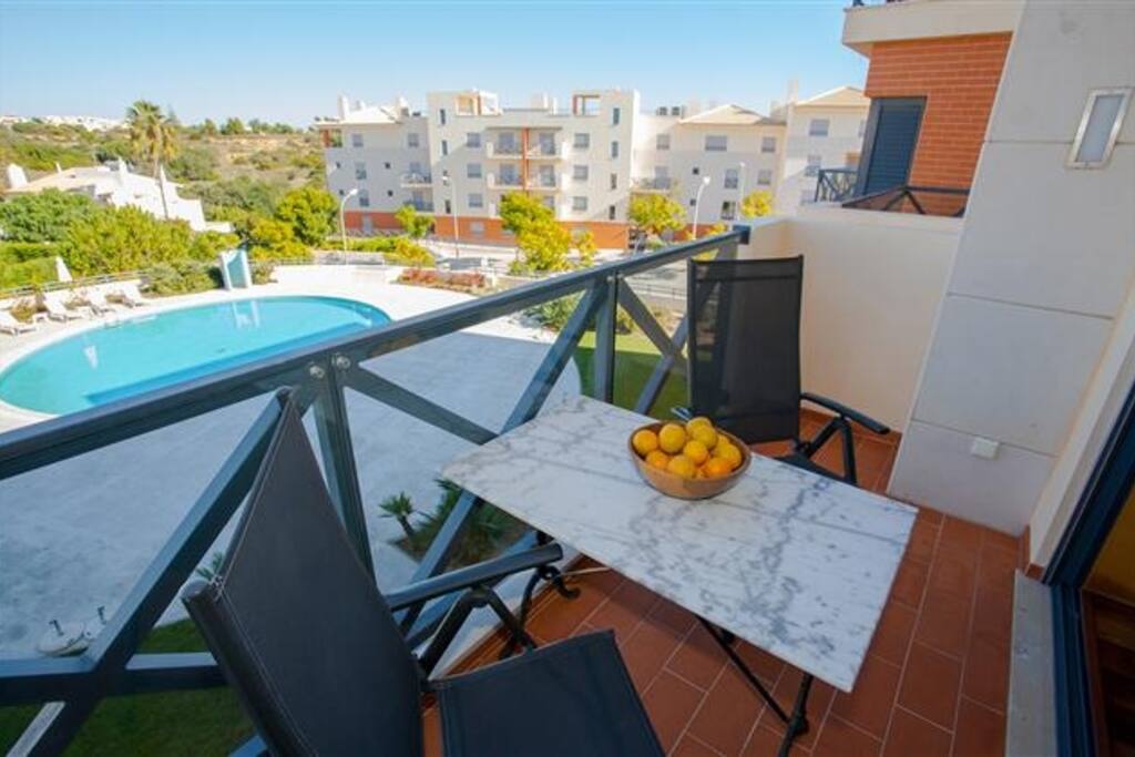 Balcony with swimming pool view.