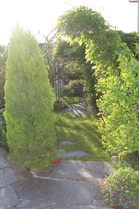 Modern studio apartment in a detached single-family home