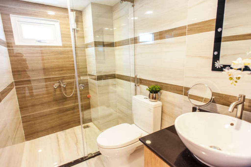 Warm shower with shampoo, body lotion, hand washing liquid