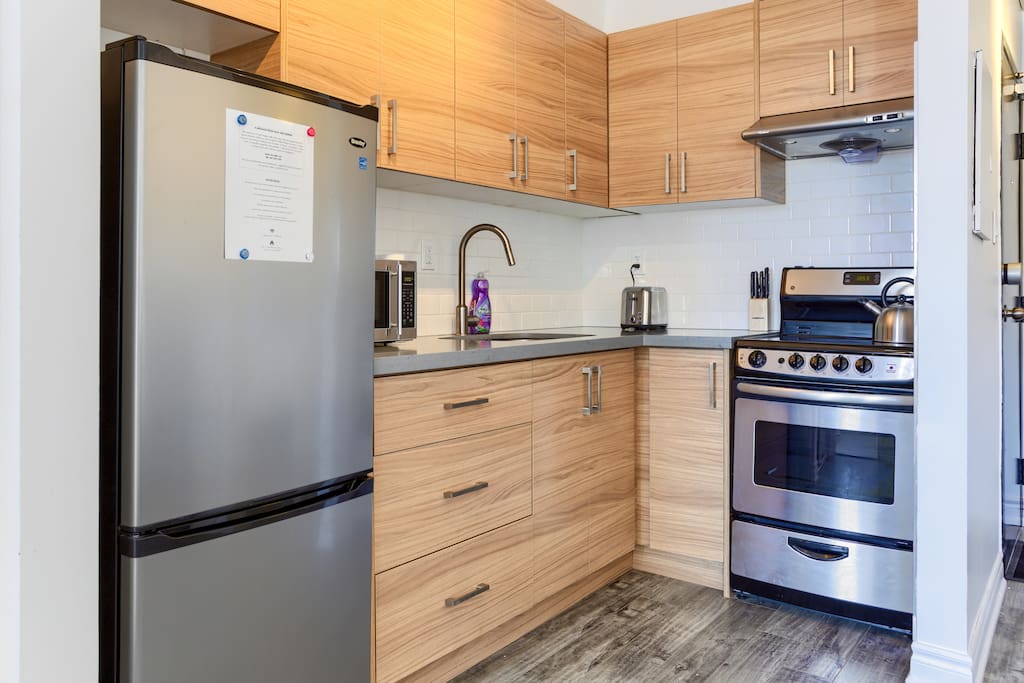 Kitchen with stainless steele appliances and all necessities to make your stay comfortable.