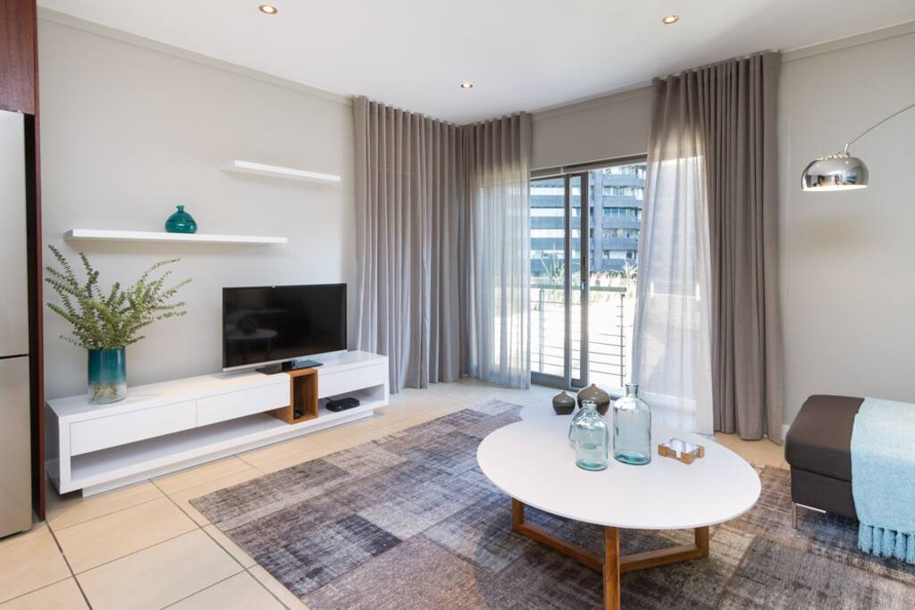 Designer Interior with spacious layout and tasteful curtaining