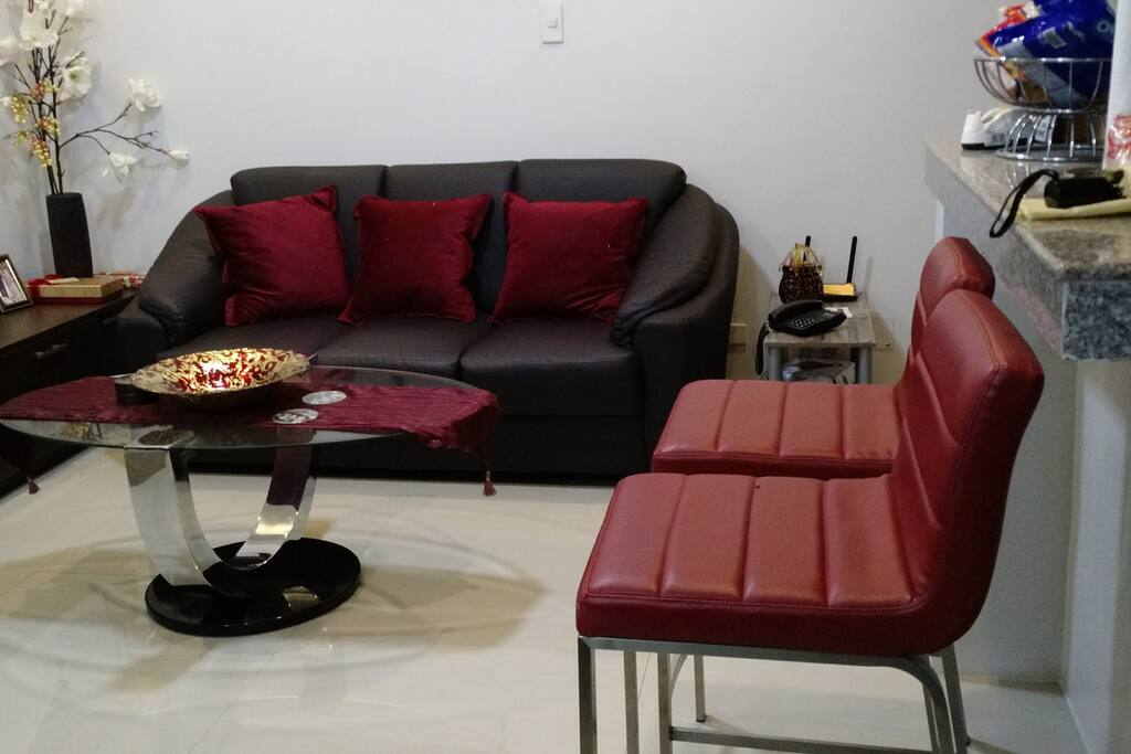 Living Room with Couch and Counter Stools
