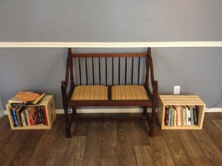 antique bench with silk lace cushion w/ mystery & art books..etc.
