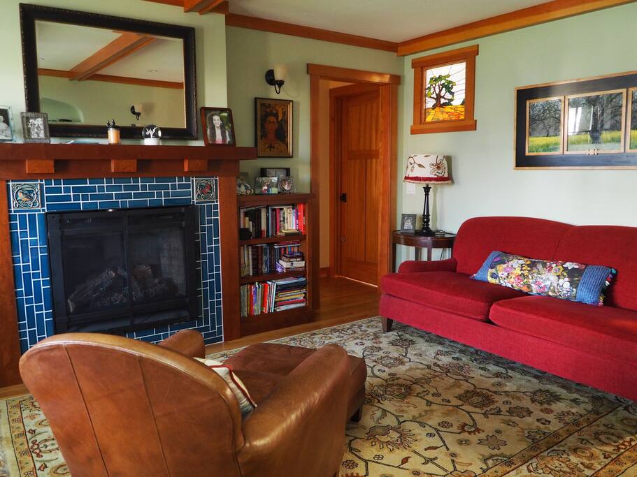 The cozy front room with fire place.