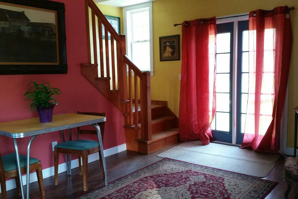 Open Dining room to French doors leading to fenced yard