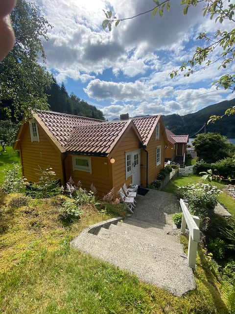 Rural house with private beach, jetty and boat