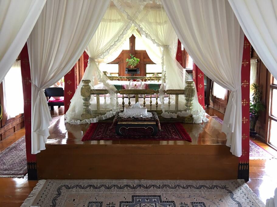 A comfortable king-sized bed located in the middle of cozy room where we have carefully selected bed cushion and linens to ensure you have a good deep sleep.