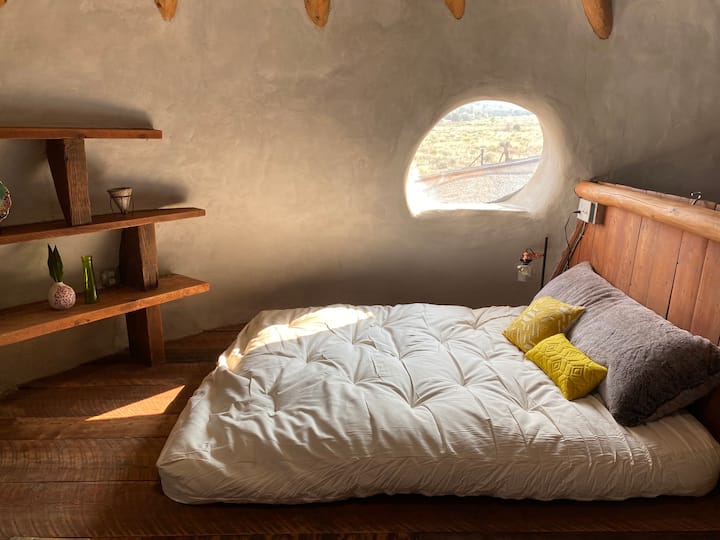 The tree house/loft with Queen size futon mattress and an impeccable view!