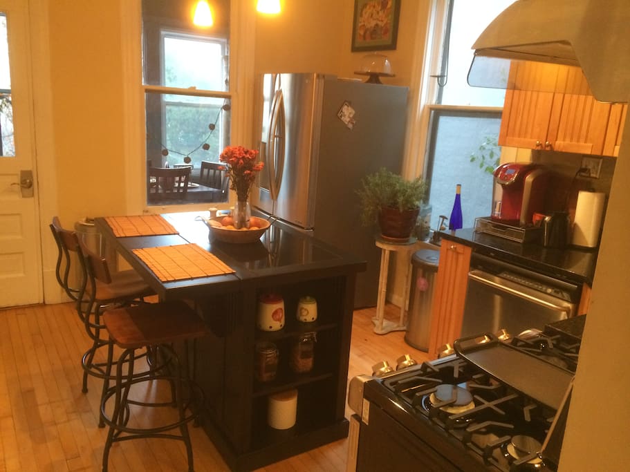 Kitchen towards enclosed back porch - new LG frig w/water-ice maker