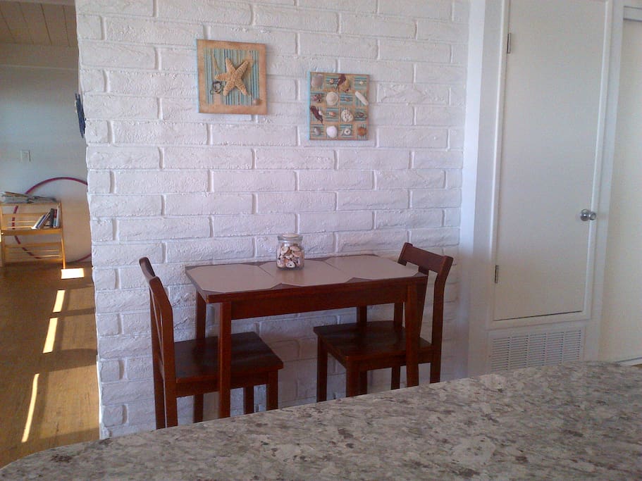 Cozy table that opens up seat 4.