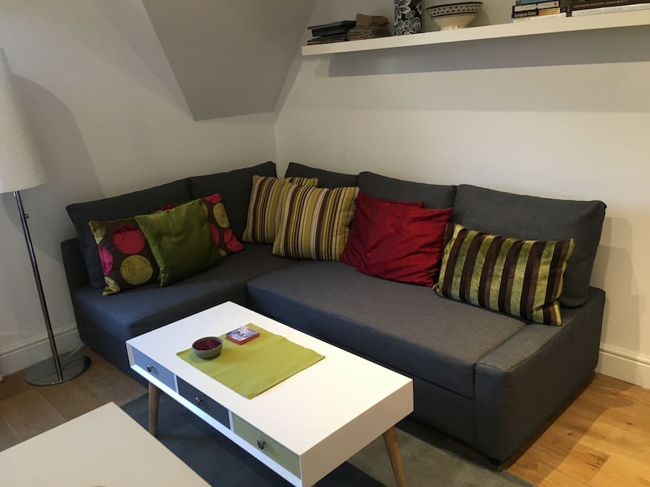 Living area with double sofa bed