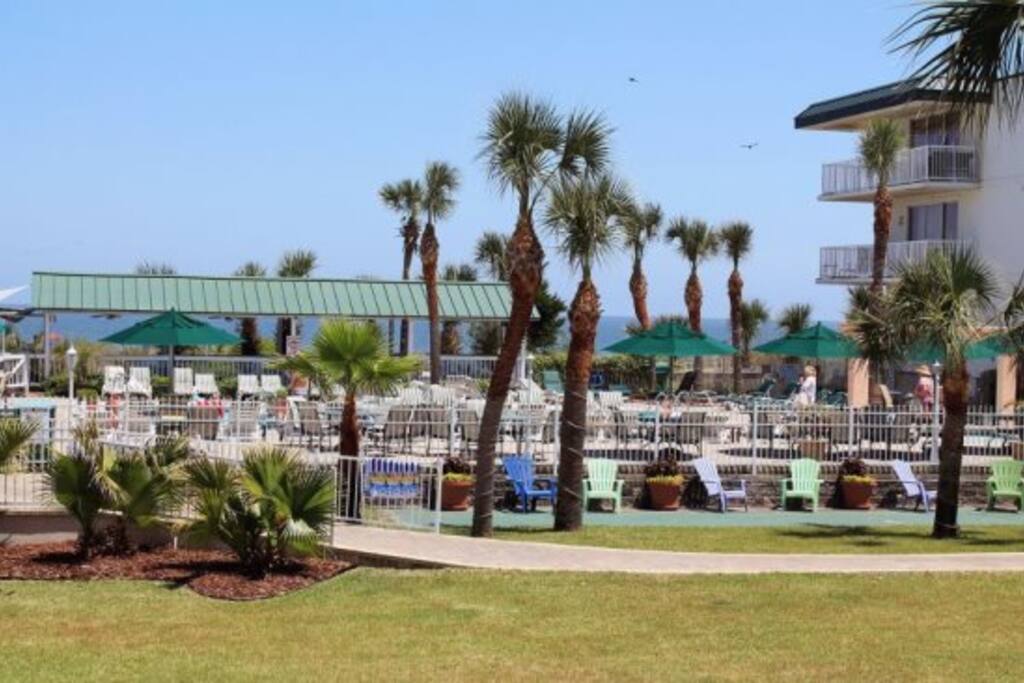 Deluxe Condos in Tybees only Resort with 3 swimming pools, one heated, and a Kiddies Pool, beachside restaurant and private beach access