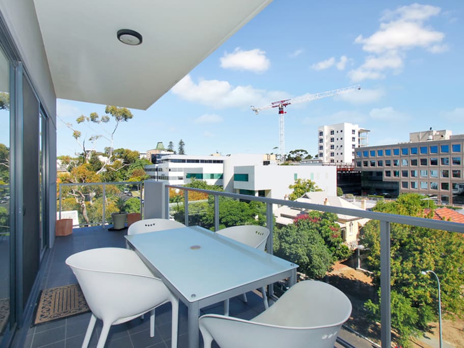 Relax on the balcony overlooking West Perth and Kings Park