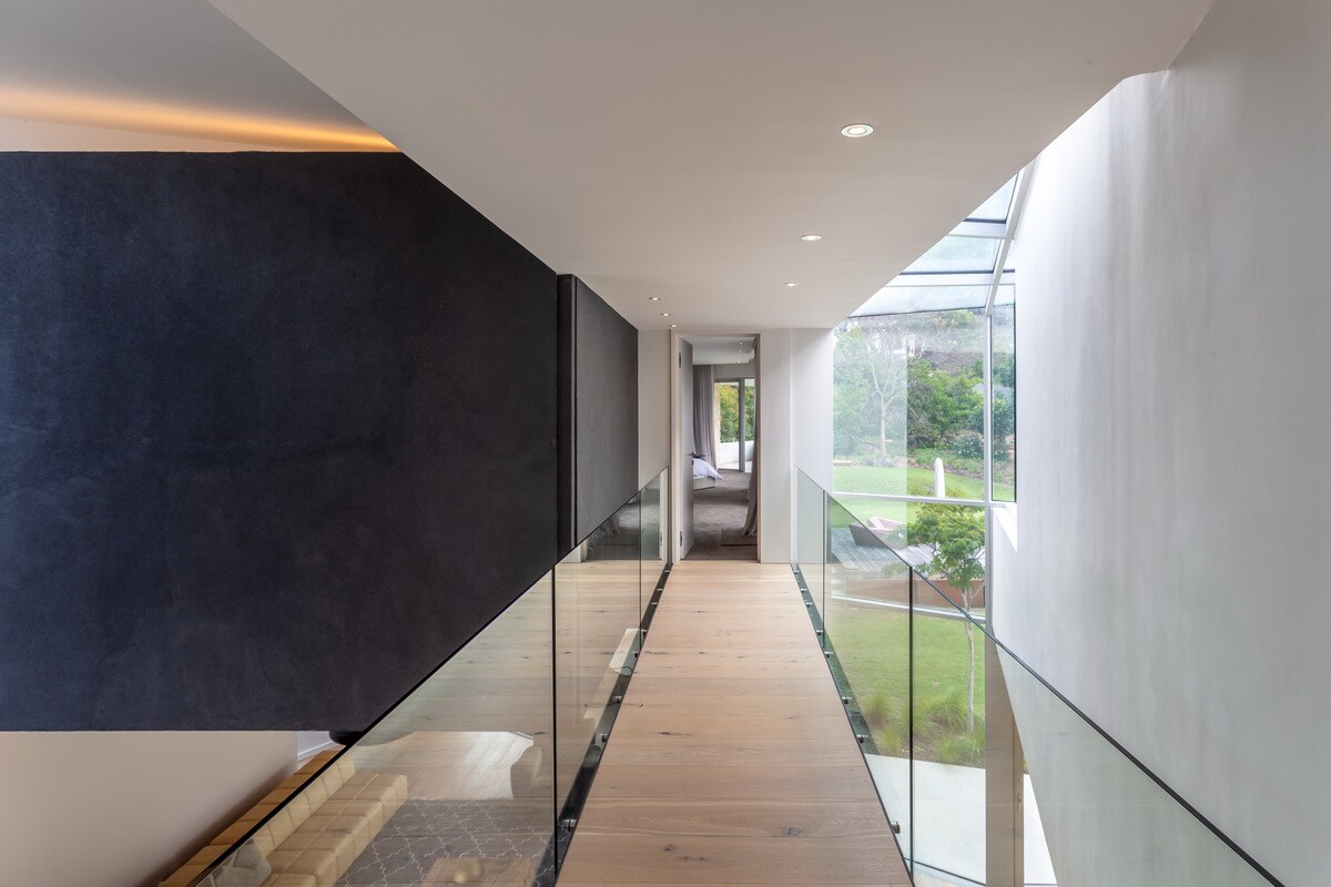 Bridge from top landing over to master bedroom