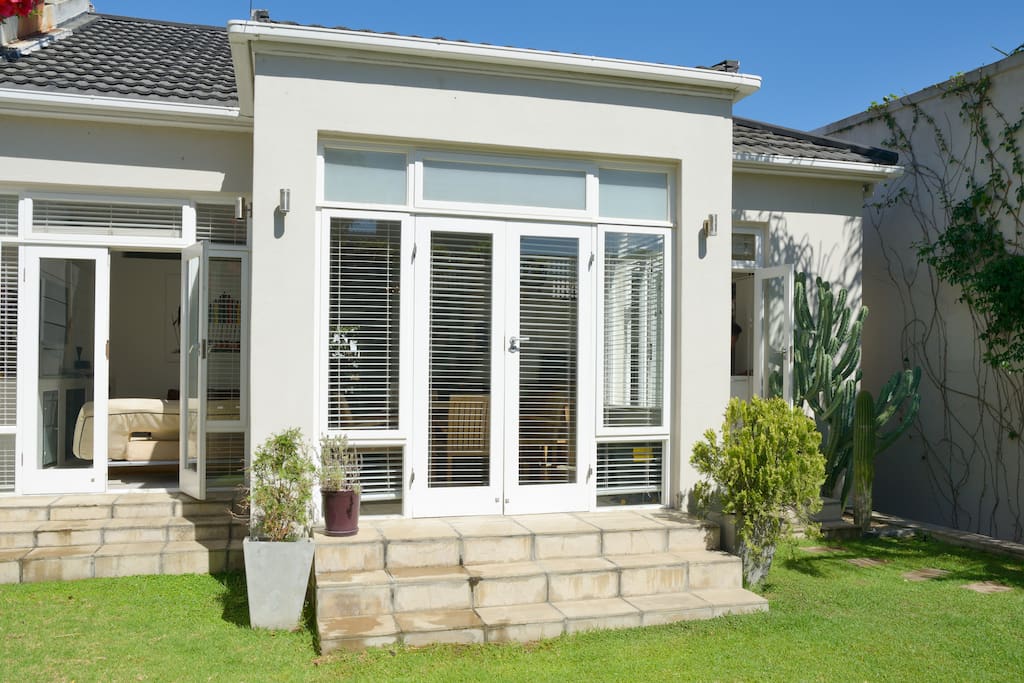 Lovely bleached doors opening out to the garden