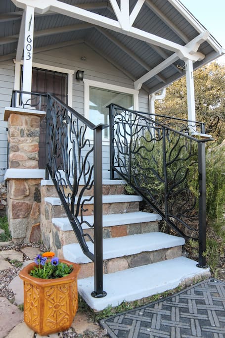 Local ironworks artist created railings.