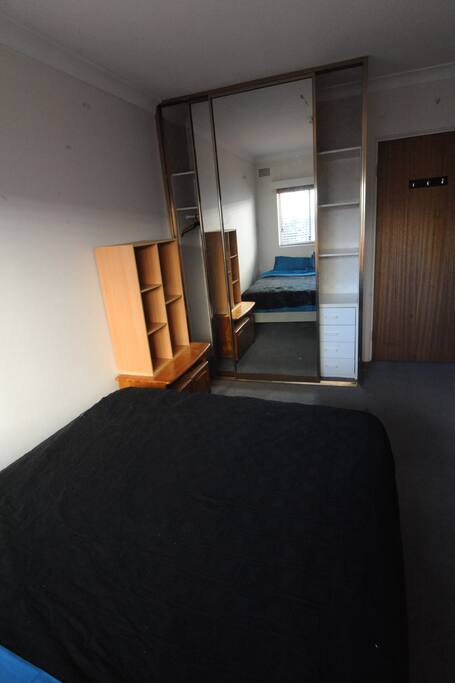 Built in wardrobe with floor to ceiling mirrors