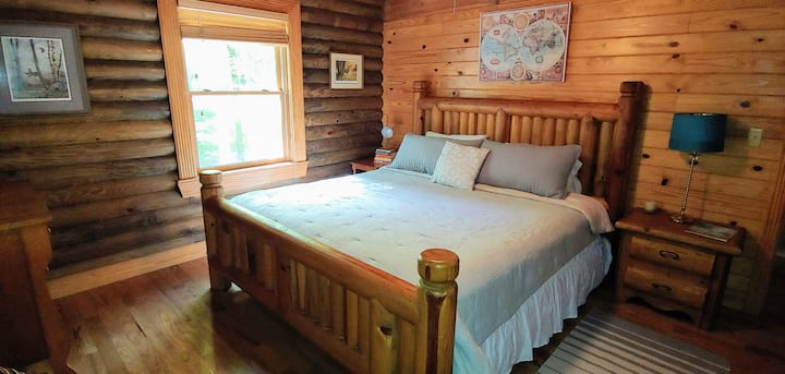 Master bedroom with California King, luxurious goose-down pillows, spacious closet and dresser