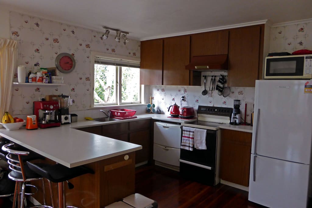 Kitchen photo, open, spacious, dishwasher, coffee machine with bean grinder for fresh coffee. Bar stools to sit at the bench, or relax while watching someone else cook. Brand new fridge for fresh groceries and ample space in the pantry for other.