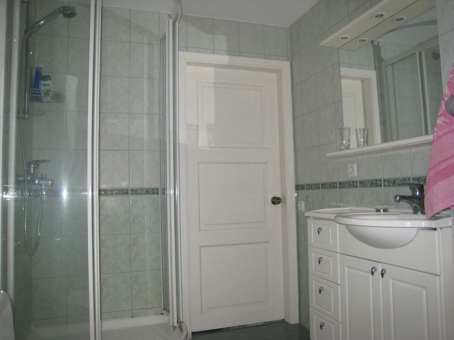 Bathroom for common use, hairdryer, washing machine