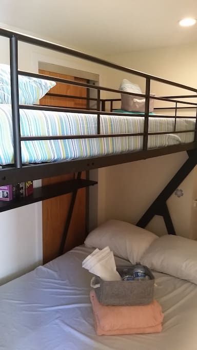 You will be on the top of a bunk bed (keep in mind the narrow space)