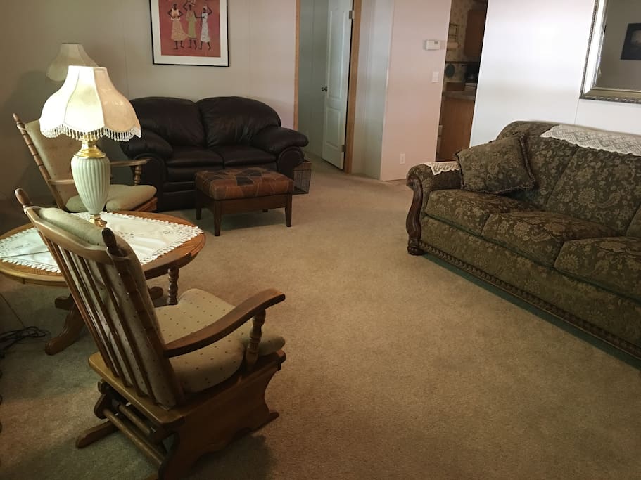 The family room is ideal for relaxing and visiting while others are in the TV room watching their favorite shows or playing games.