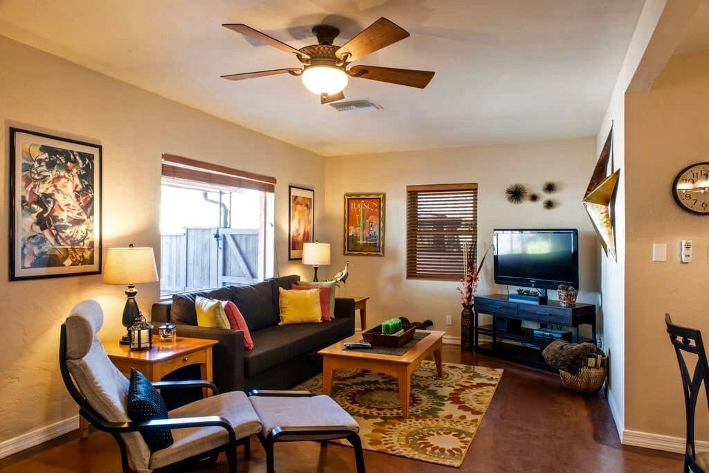 Livingroom over looks the private patio. Polished concrete floors in all rooms except kitchen and bath have tile Floors.