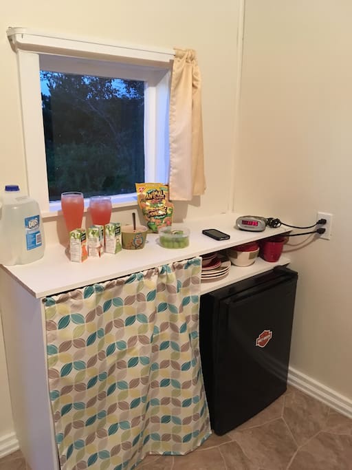 Housekeeping bunk house complete with fridge, tabletop bbq, hotplate, kettle, toaster, dishes, utensils, pots and pans.