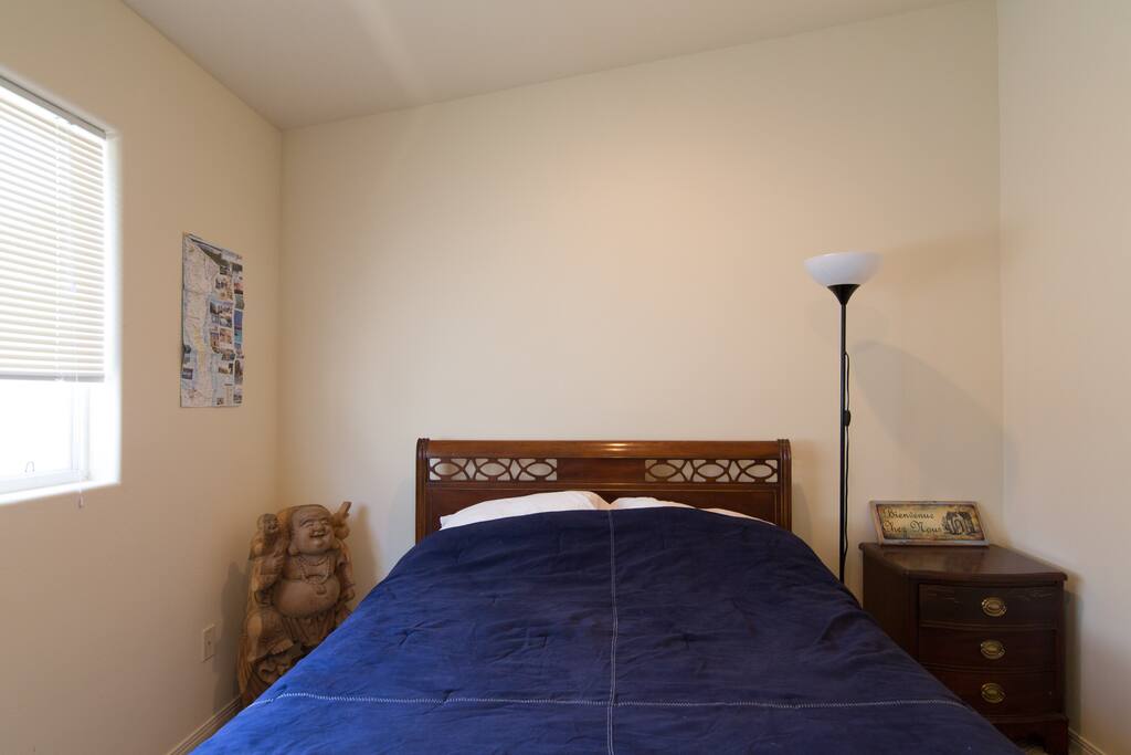 Air mattress is in the closet and goes at the foot of the bed if you have a third guest.