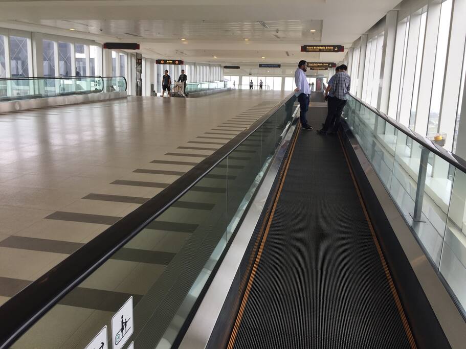 Runway Manila a Footbridge. Avoid accidents and the hassle of crossing the busy street of Andrew’s Avenue by taking this footbridge that connects the airport Terminal 3 to Newport City. It has walkalators. It has also tram for seniors , people with disabilities and pregnant women. You will get to my place in 5- 7 minutes. The access is located inside the airport terminal 3 upper food court level 4 near Mary Grace, KFC and Manila Life Cafe. :-)