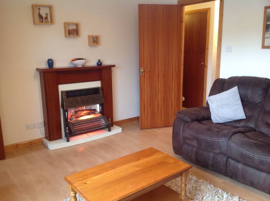 Lovely comfortable lounge with warm fireplace and large corner sofa. TV with freeview channels for you to enjoy