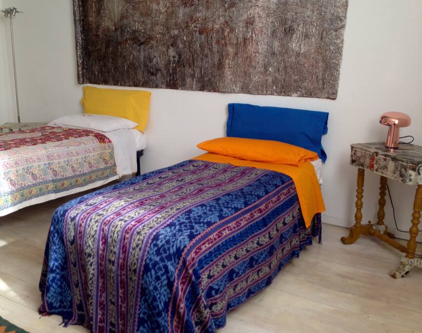 the bedroom with two single beds
