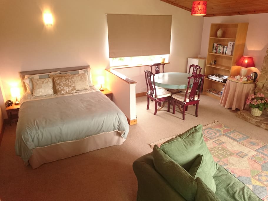King size bed, dining and sitting areas