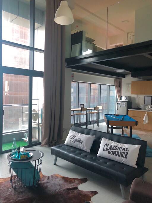 Overview from living hall to dining area & upper level