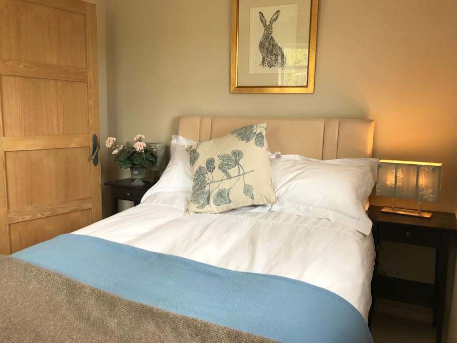 Lovely dual aspect double bedroom with down duvet and White Co. linen