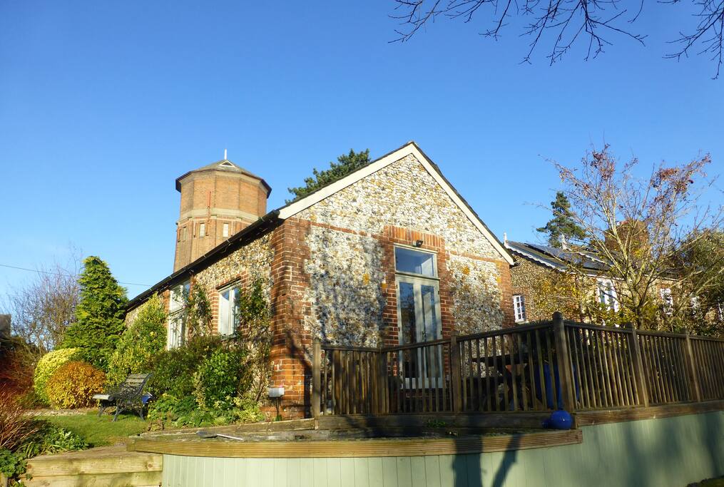 The manger from the garden with the water tower in the back ground.