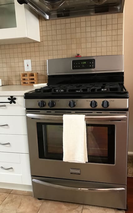 Stove with oven and exhausted fan.