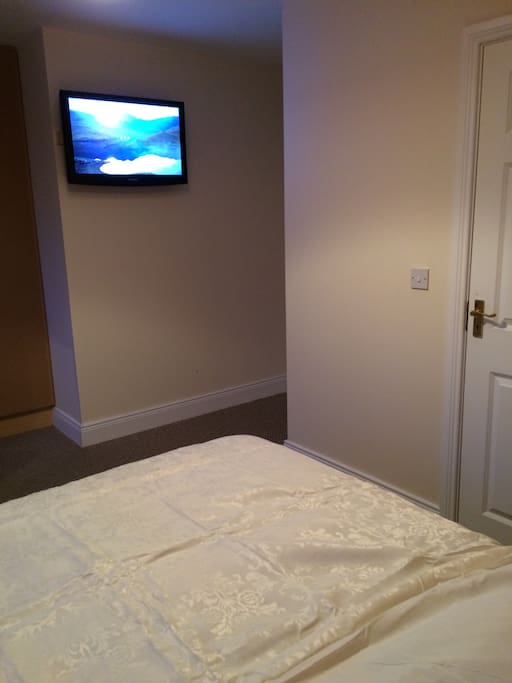 Master bedroom with TV