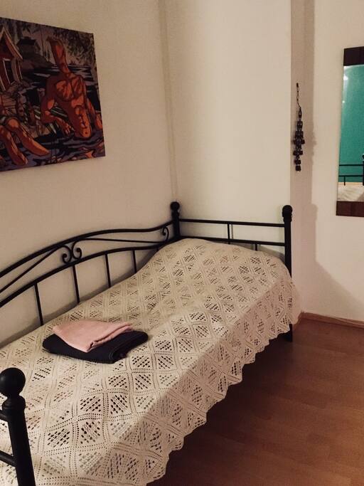 Bed in the living room.