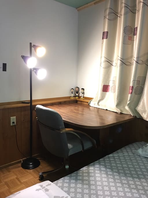 A table, chair and light should satisfy your need to work, while we hope you could have wonderful stay in this nice room.