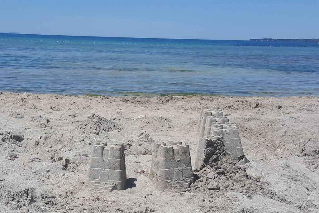 sandy beach situated very close to the house