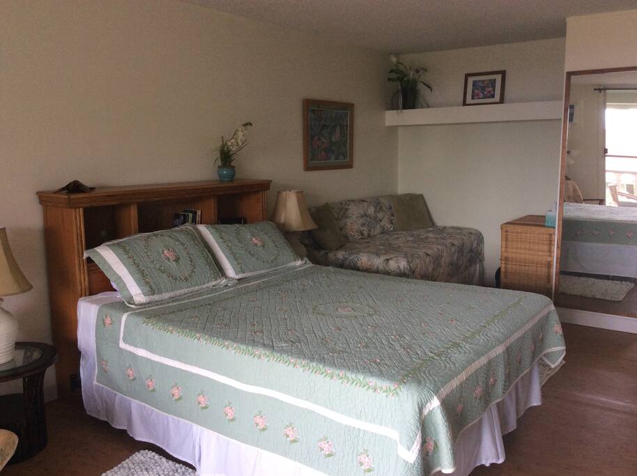 Queen size bed w/memory foam topper.