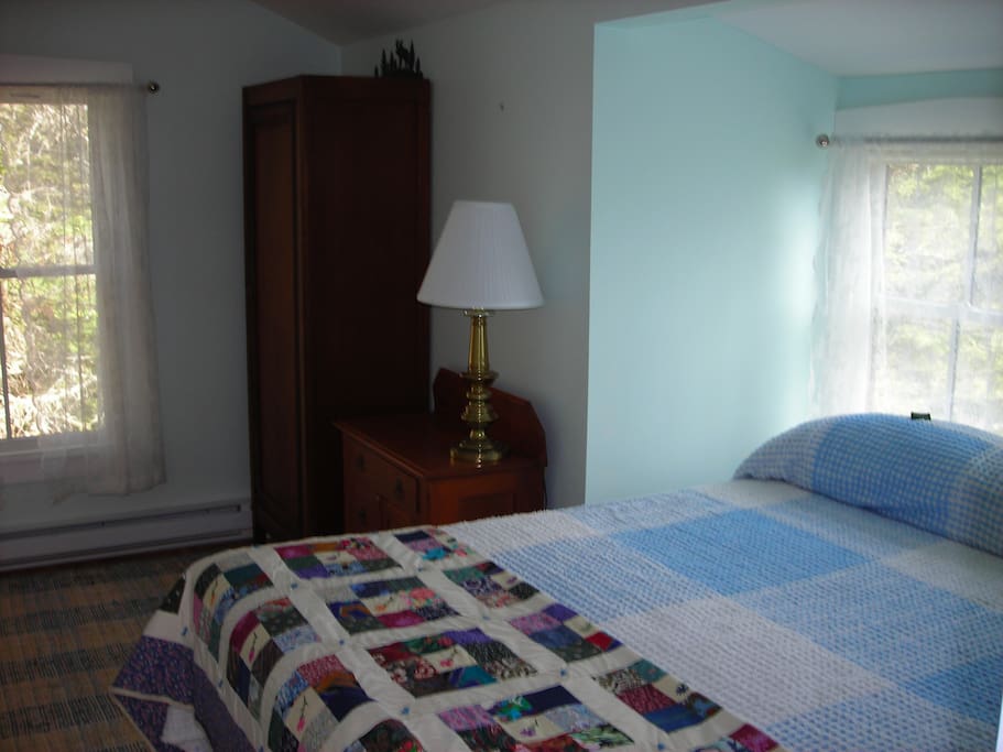 Second bedroom on the second floor with a queen size bed